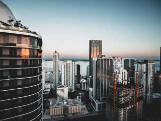 DigitalBridge Group faces analyst downgrades amidst market uncertainty