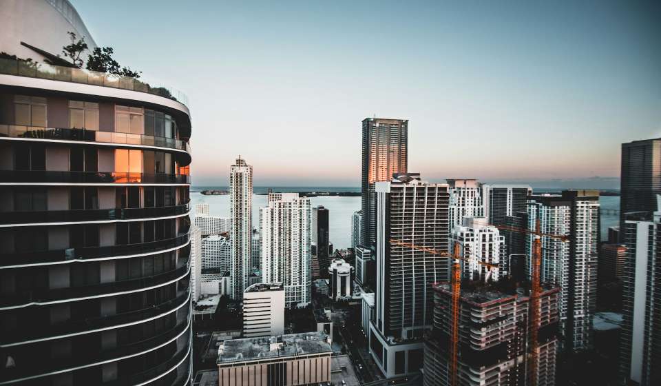 DigitalBridge Group faces analyst downgrades amidst market uncertainty