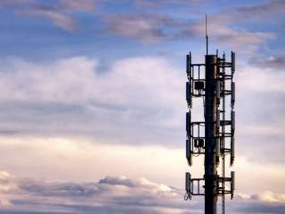 Asset managers expand holdings in American Tower as analysts adjust price targets
