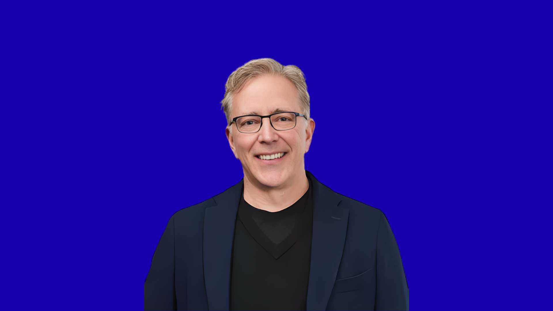 Chris Stansbury in blue background