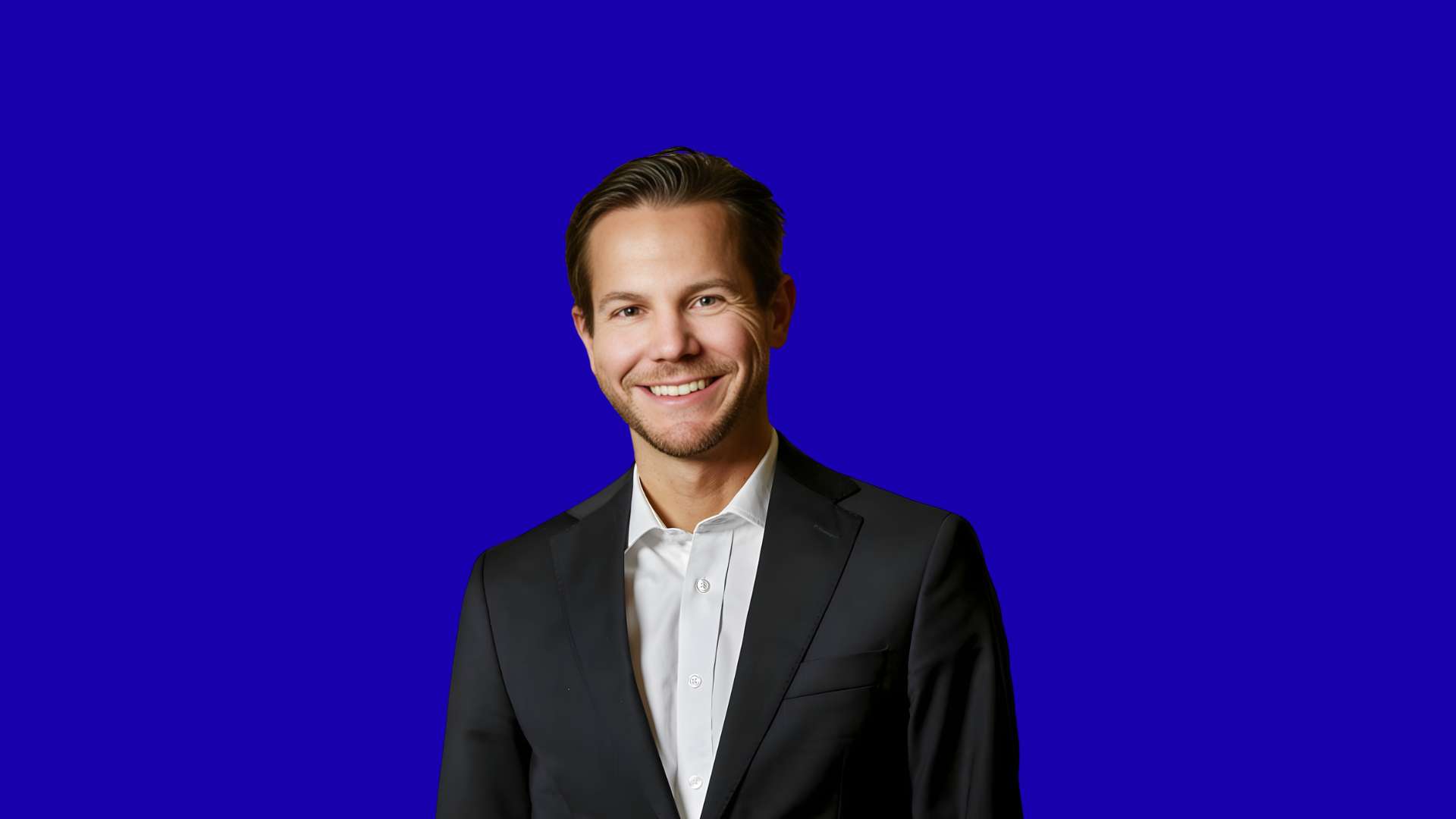 Johan Rydmark in blue background