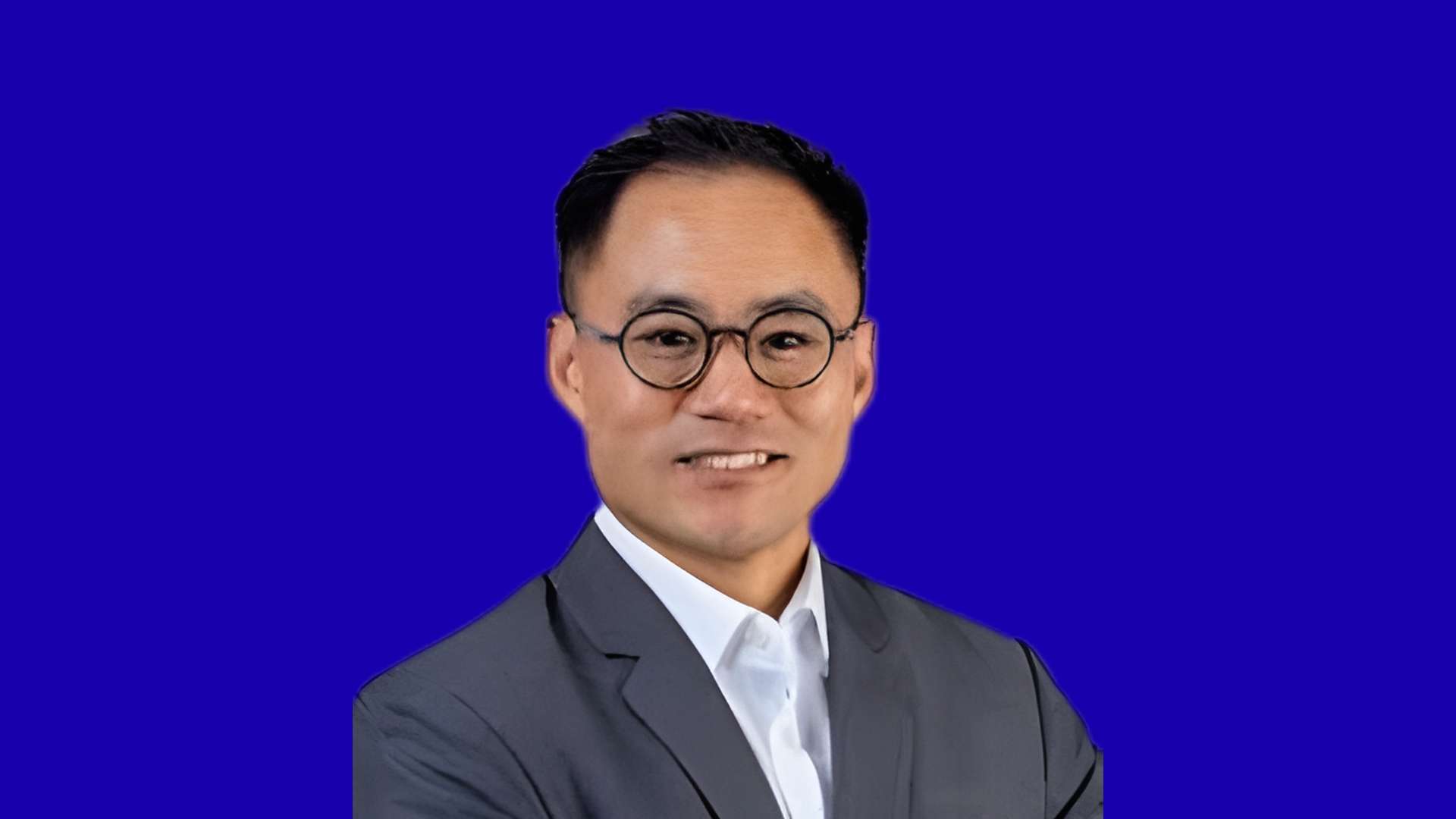 Julian Johnson in blue background