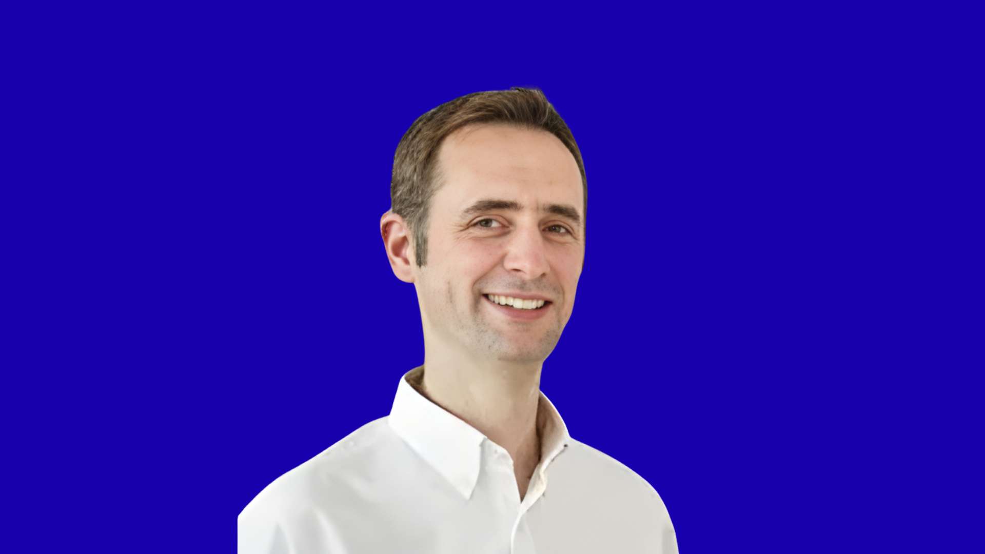 Matthew Harris in blue background