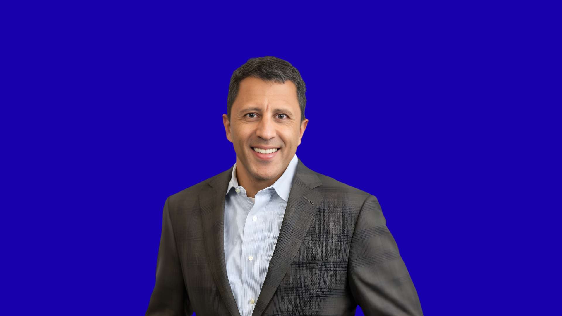 Sharif Metwalli in blue background