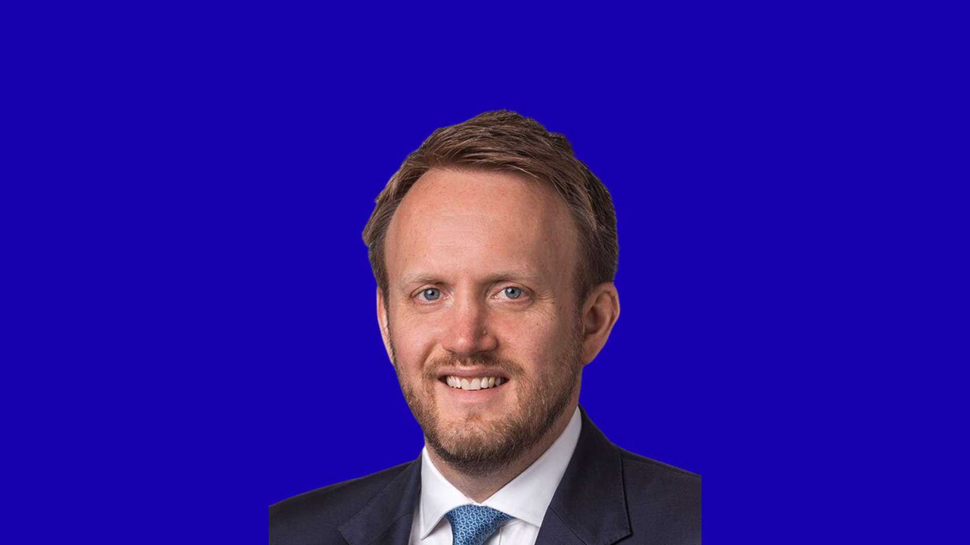 Steve Howden in blue background