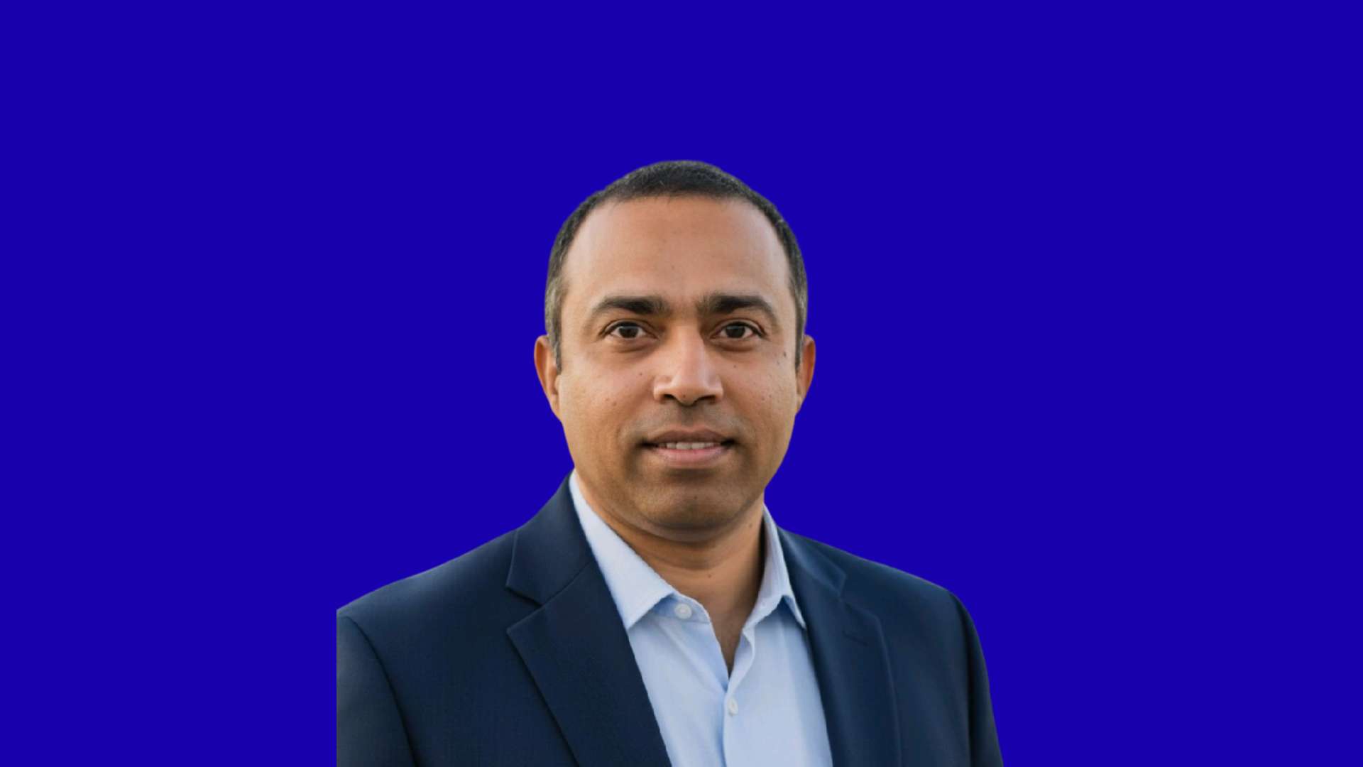 Vijay Tripathi in blue background